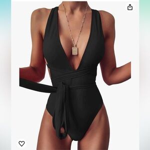 BRAND NEW. Black one piece. Size M. Bought for 40$.